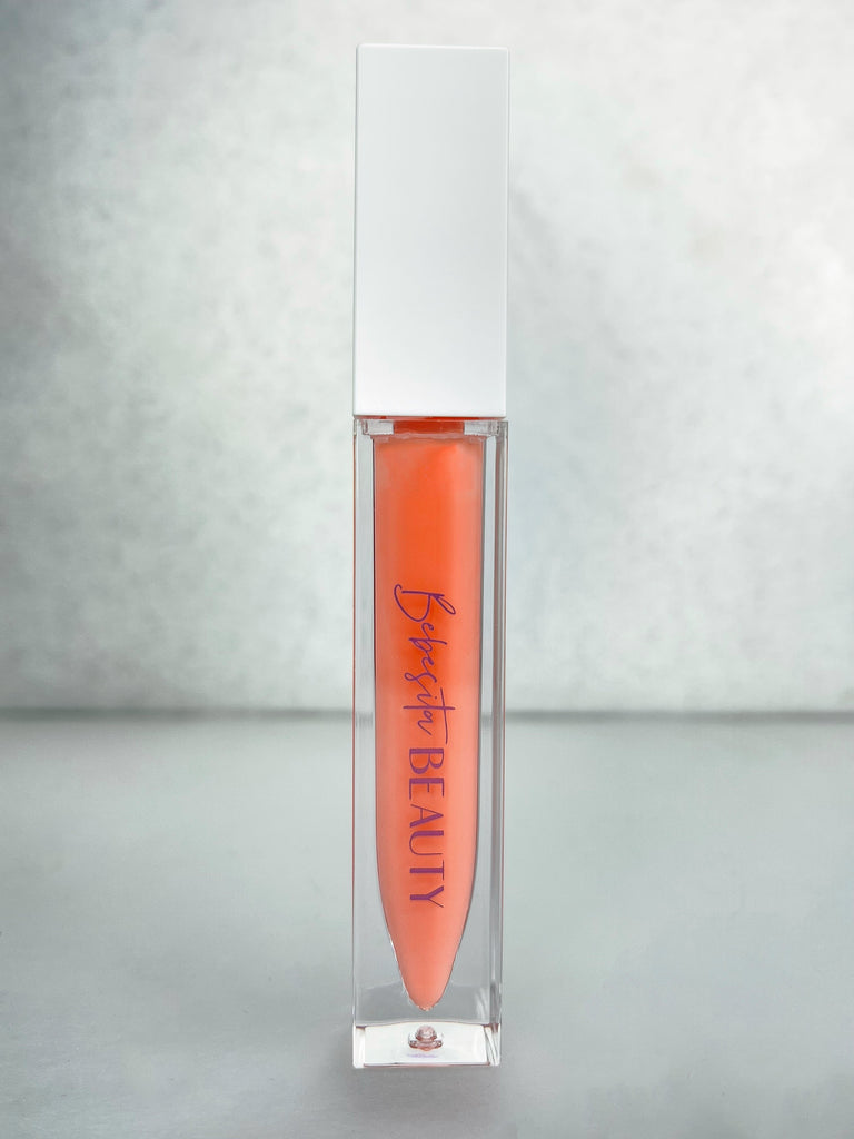 Super sheer and almost clear but with a subtle pink undertone to make your lips look pouty and supple. Mamacita kicks the look of clear gloss up a notch giving you a clean, natural look. Wear Mamacita when you want that soft, dewy glow... an absolutely perfect shade for the office...