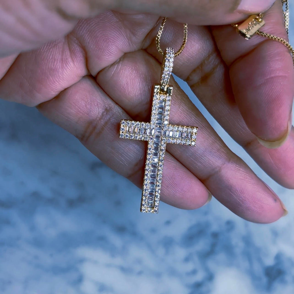 Regalo - Cross Pendant Necklace Crystal pave and baguette cross pendant necklace. 1 1/2" in length 1/2" wide 18k gold plated, tarnish resistant and water resistant on an adjustable 20" box chain. 